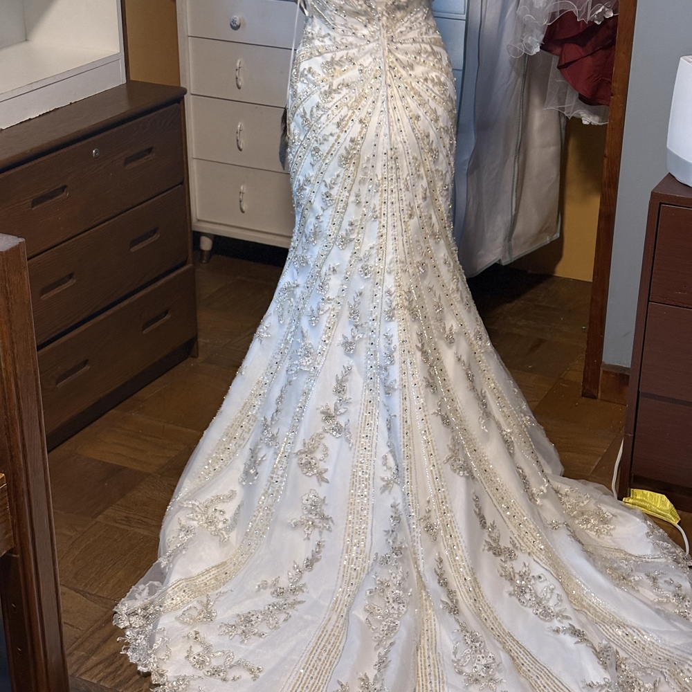 Elegant White and Gold Embellished Gown